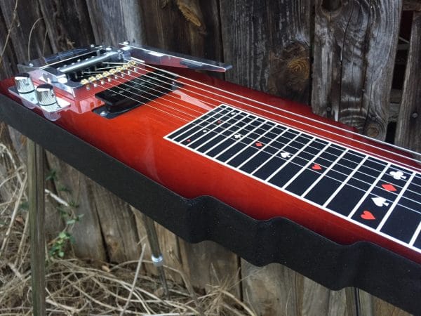 8 string lap steel on legs